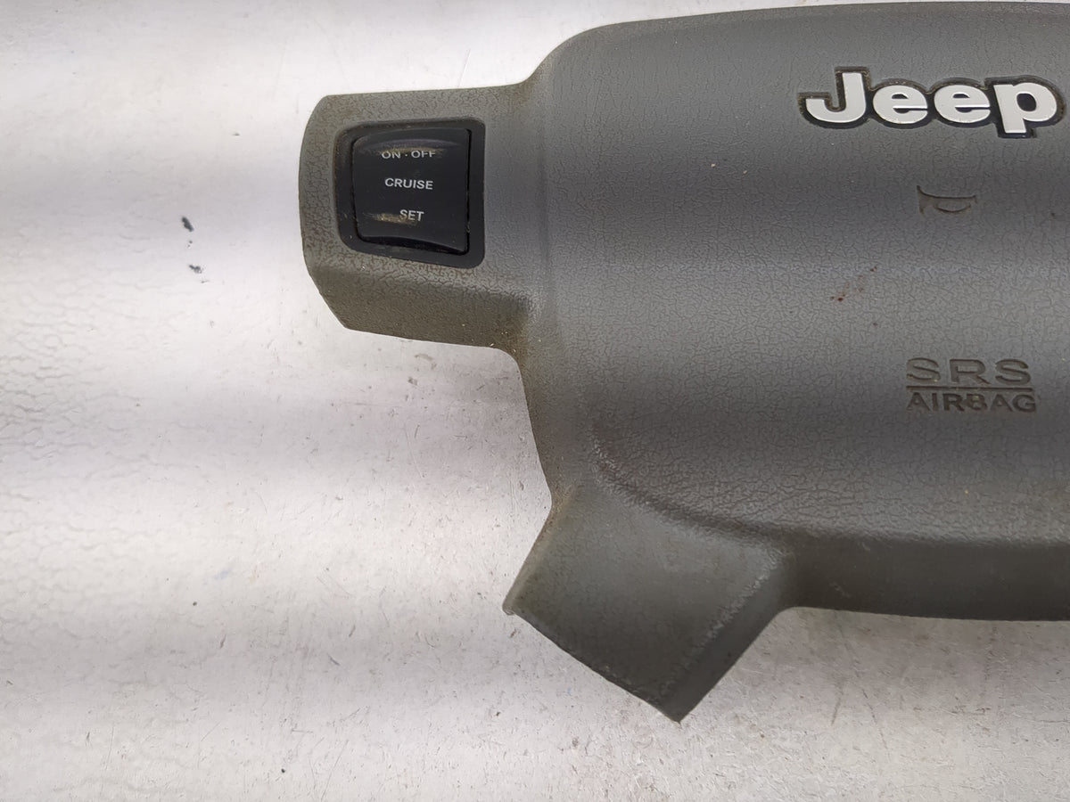 2005-2007 Jeep Grand Cherokee Air Bag Driver Left Steering Wheel Mounted 5025665 - Oemusedautoparts1.com