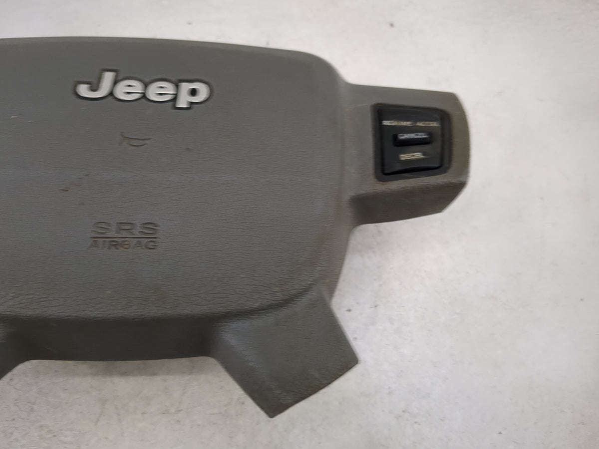 2005-2007 Jeep Grand Cherokee Air Bag Driver Left Steering Wheel Mounted 5025665 - Oemusedautoparts1.com