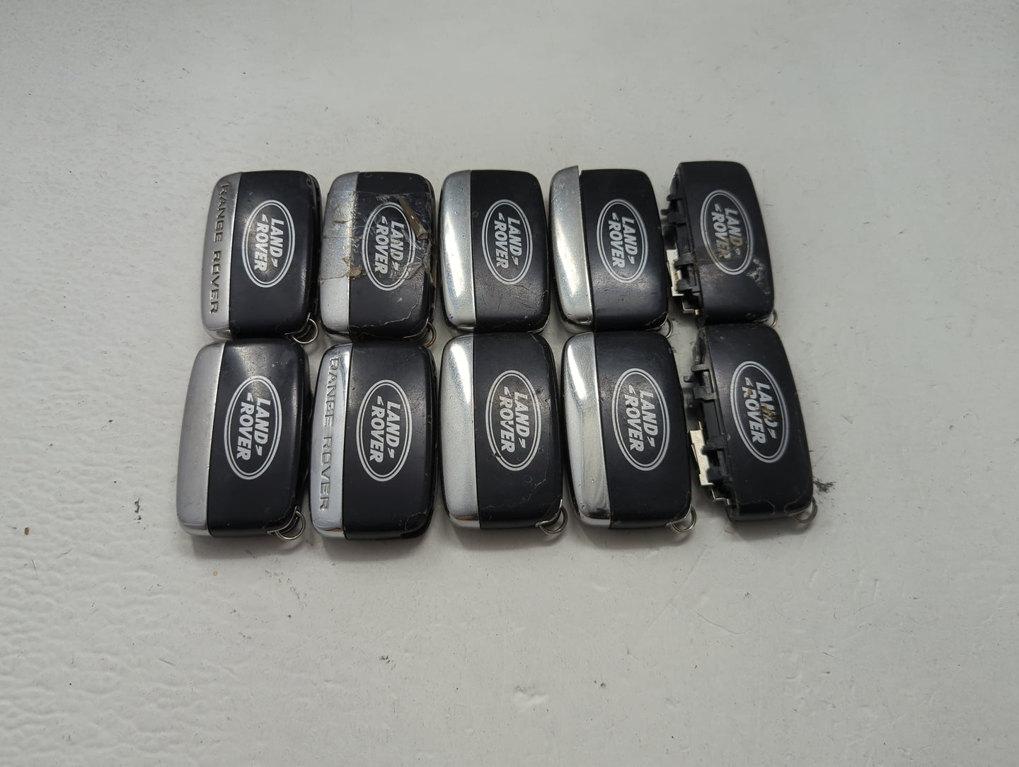 Lot of 10 Land Rover Keyless Entry Remote Fob MIXED FCC IDS MIXED PART 1474189 - Oemusedautoparts1.com