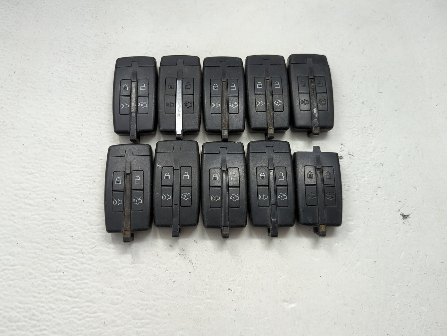 Lot of 10 Lincoln Keyless Entry Remote Fob MIXED FCC IDS MIXED PART 1476313 - Oemusedautoparts1.com