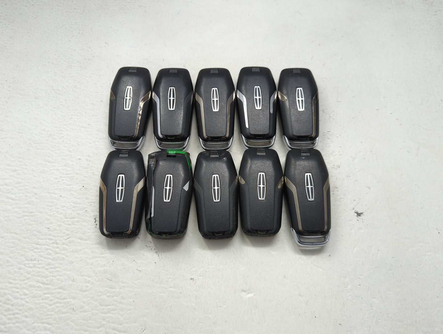 Lot of 10 Lincoln Keyless Entry Remote Fob MIXED FCC IDS MIXED PART 1476368 - Oemusedautoparts1.com