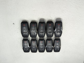 compare product Lot of 10 Lincoln Keyless Entry Remote Fob MIXED FCC IDS MIXED PART 1476379