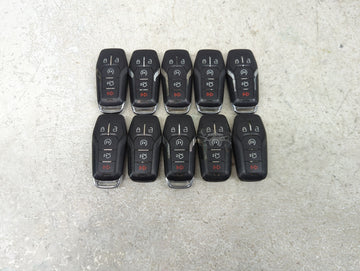 Lot of 10 Lincoln Keyless Entry Remote Fob MIXED FCC IDS MIXED PART 1476379 - Oemusedautoparts1.com