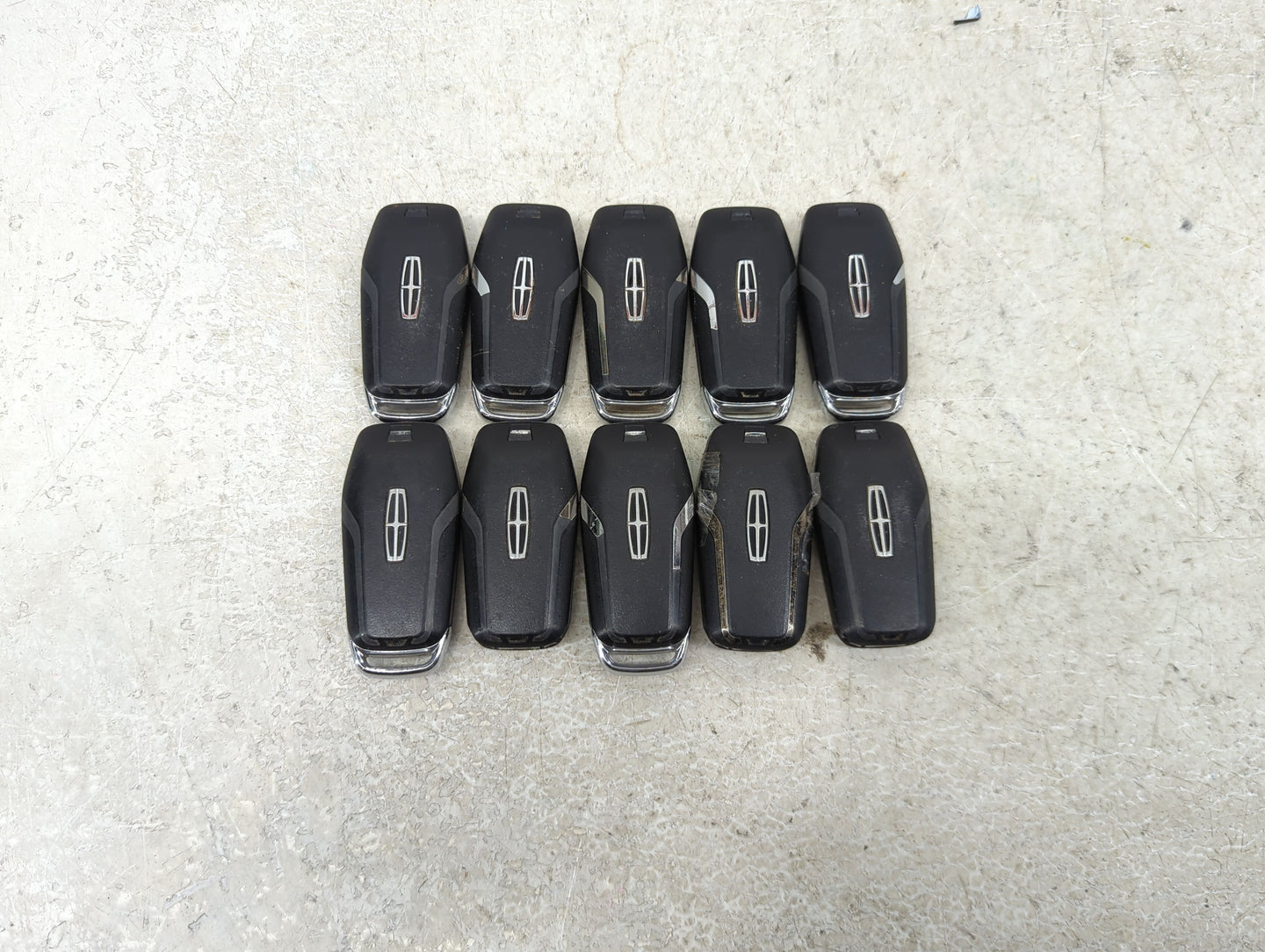 Lot of 10 Lincoln Keyless Entry Remote Fob MIXED FCC IDS MIXED PART 1476379 - Oemusedautoparts1.com
