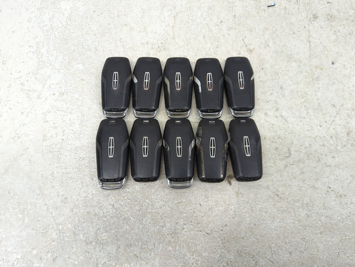 Lot of 10 Lincoln Keyless Entry Remote Fob MIXED FCC IDS MIXED PART 1476379 - Oemusedautoparts1.com