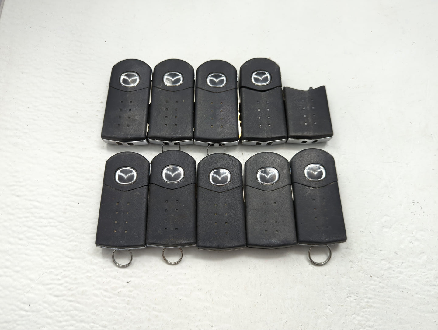 Lot of 10 Mazda Keyless Entry Remote Fob MIXED FCC IDS MIXED PART - Oemusedautoparts1.com