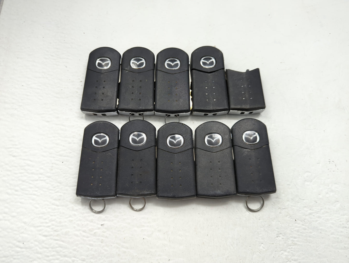 Lot of 10 Mazda Keyless Entry Remote Fob MIXED FCC IDS MIXED PART - Oemusedautoparts1.com