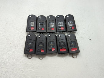 compare product Lot of 10 Mazda Keyless Entry Remote Fob MIXED FCC IDS 1475821
