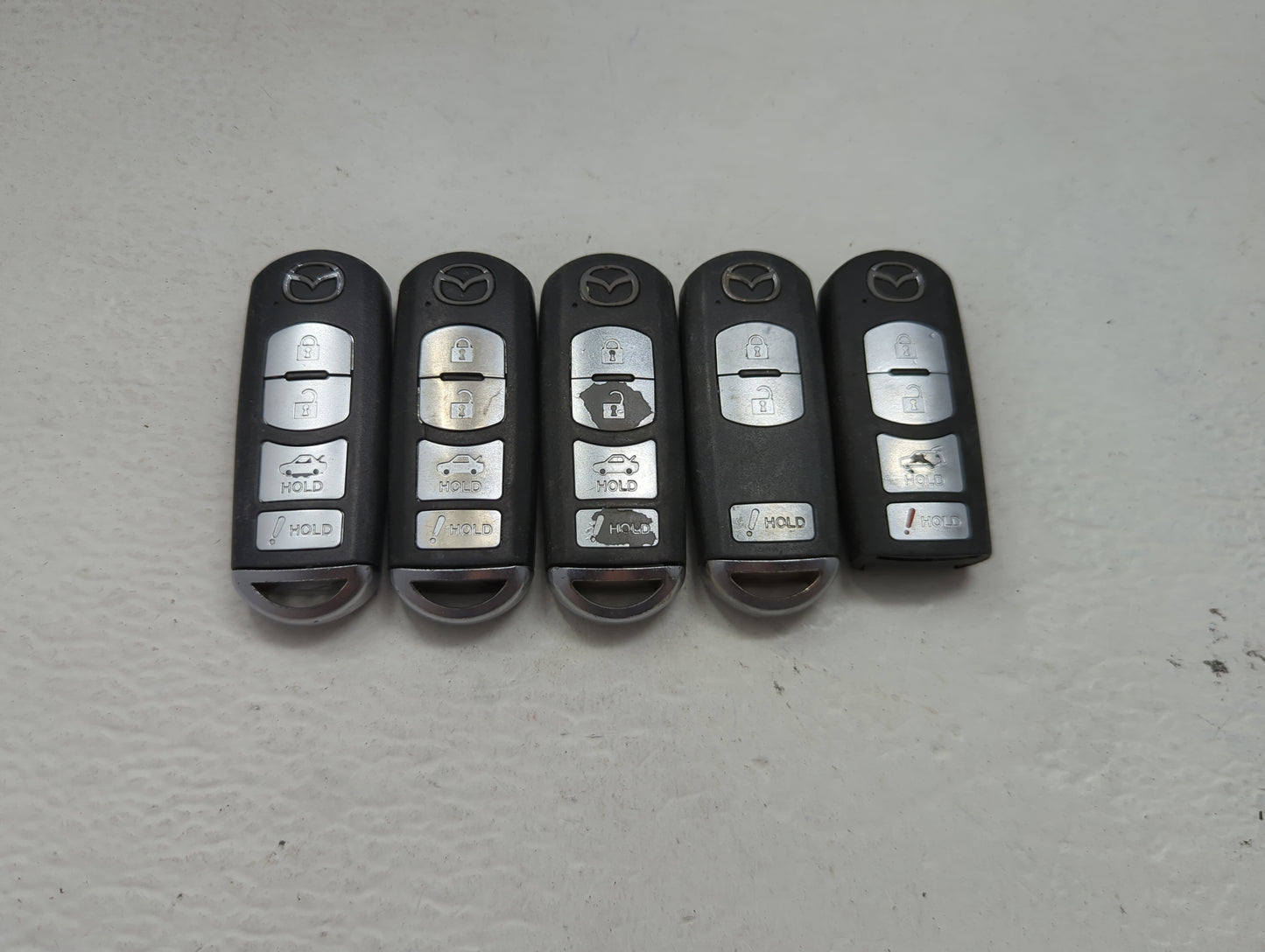 Lot of 5 Mazda Keyless Entry Remote Fob MIXED FCC IDS 1475823 - Oemusedautoparts1.com