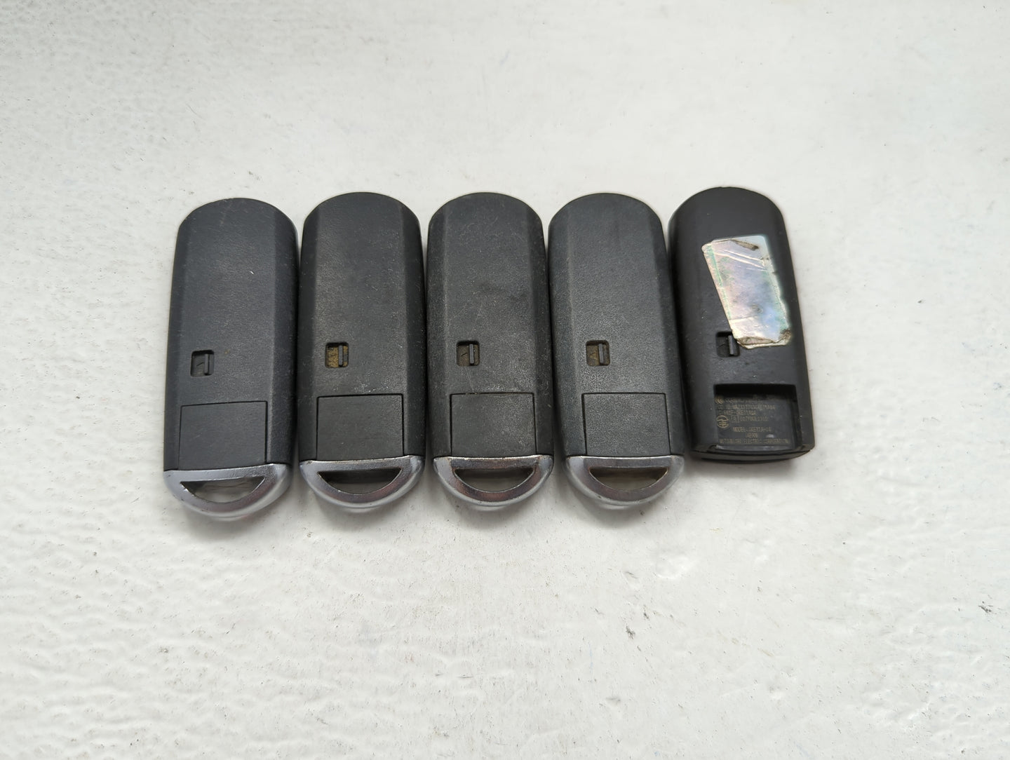 Lot of 5 Mazda Keyless Entry Remote Fob MIXED FCC IDS 1475823 - Oemusedautoparts1.com