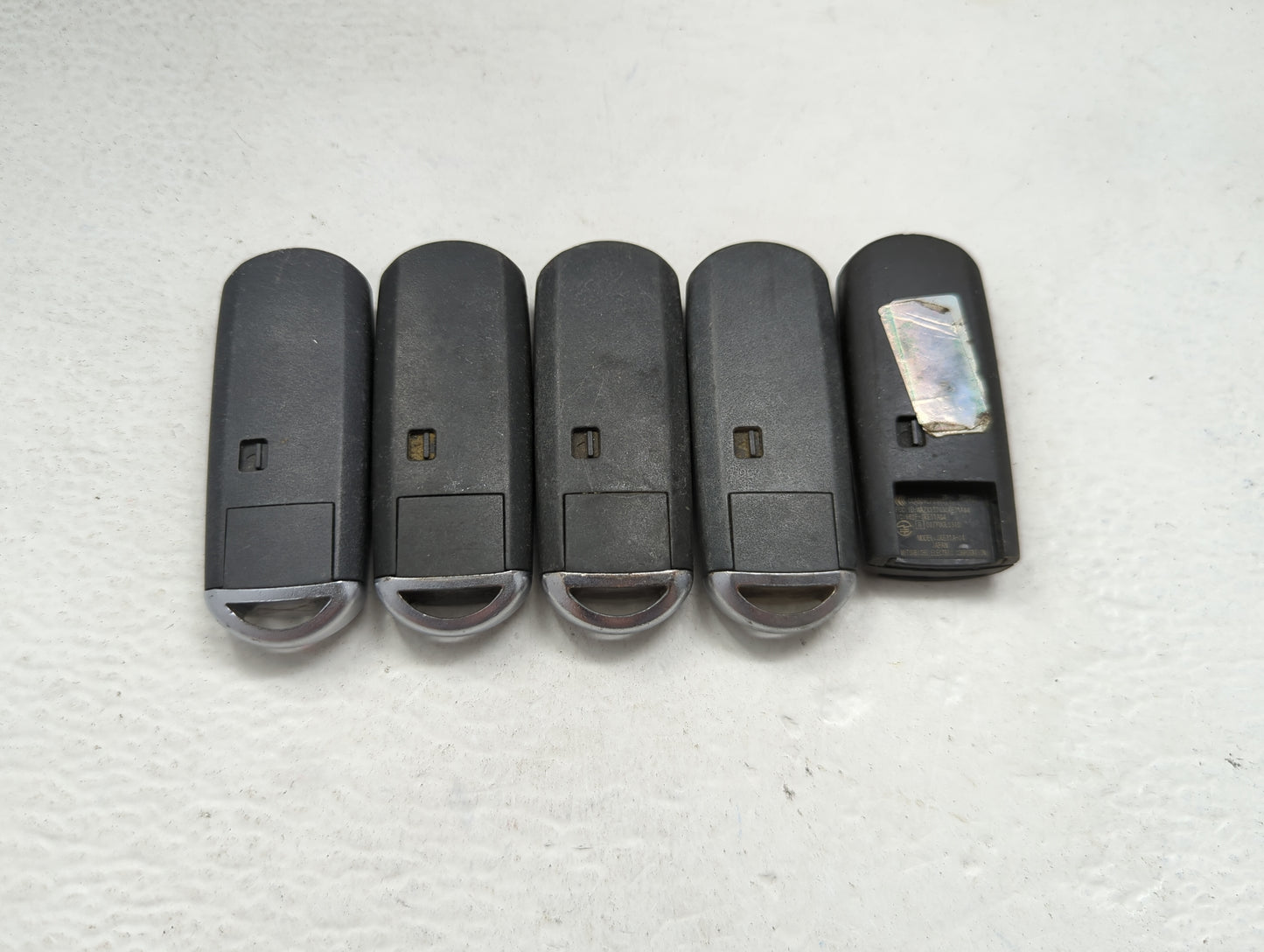 Lot of 5 Mazda Keyless Entry Remote Fob MIXED FCC IDS 1475823 - Oemusedautoparts1.com