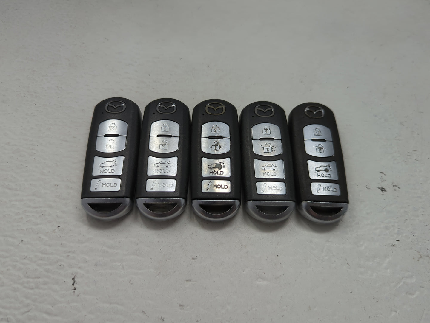 Lot of 5 Mazda Keyless Entry Remote Fob MIXED FCC IDS 1475824 - Oemusedautoparts1.com