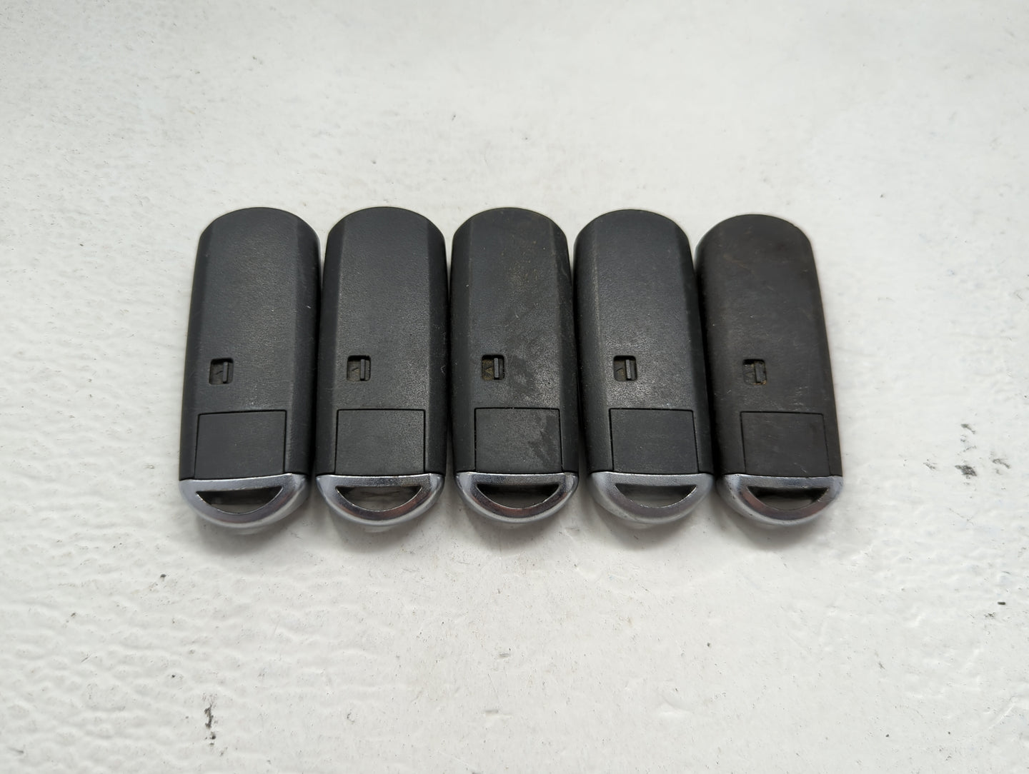 Lot of 5 Mazda Keyless Entry Remote Fob MIXED FCC IDS 1475824 - Oemusedautoparts1.com