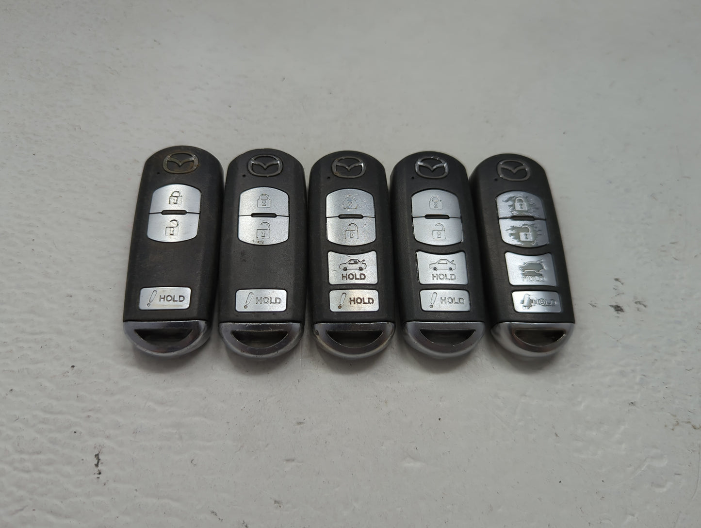 Lot of 5 Mazda Keyless Entry Remote Fob MIXED FCC IDS 1475825 - Oemusedautoparts1.com