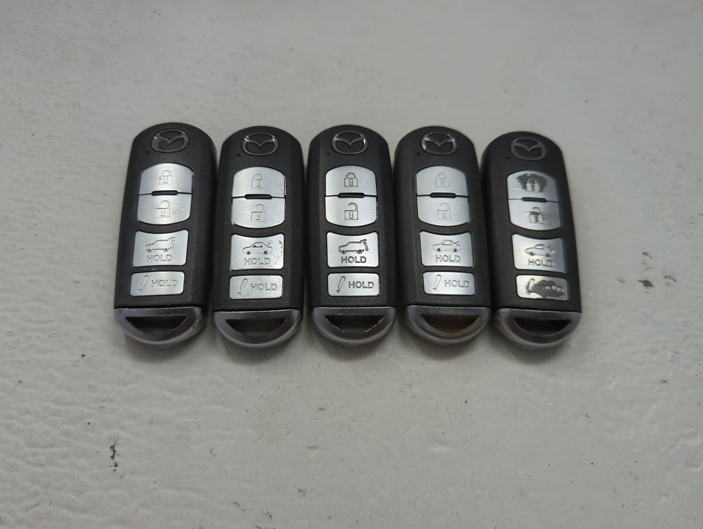 Lot of 5 Mazda Keyless Entry Remote Fob MIXED FCC IDS 1475826 - Oemusedautoparts1.com