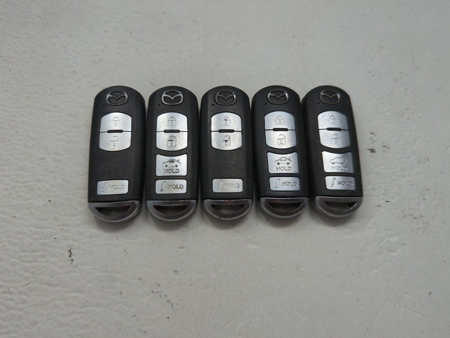 Lot of 5 Mazda Keyless Entry Remote Fob MIXED FCC IDS 1475827 - Oemusedautoparts1.com