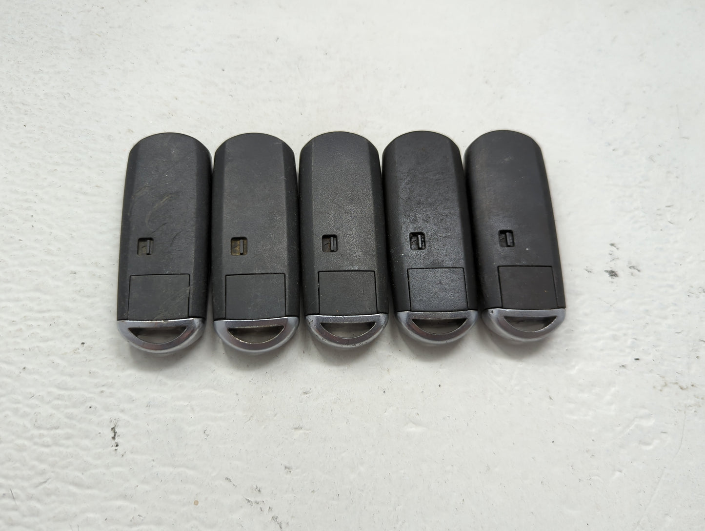 Lot of 5 Mazda Keyless Entry Remote Fob MIXED FCC IDS 1475827 - Oemusedautoparts1.com