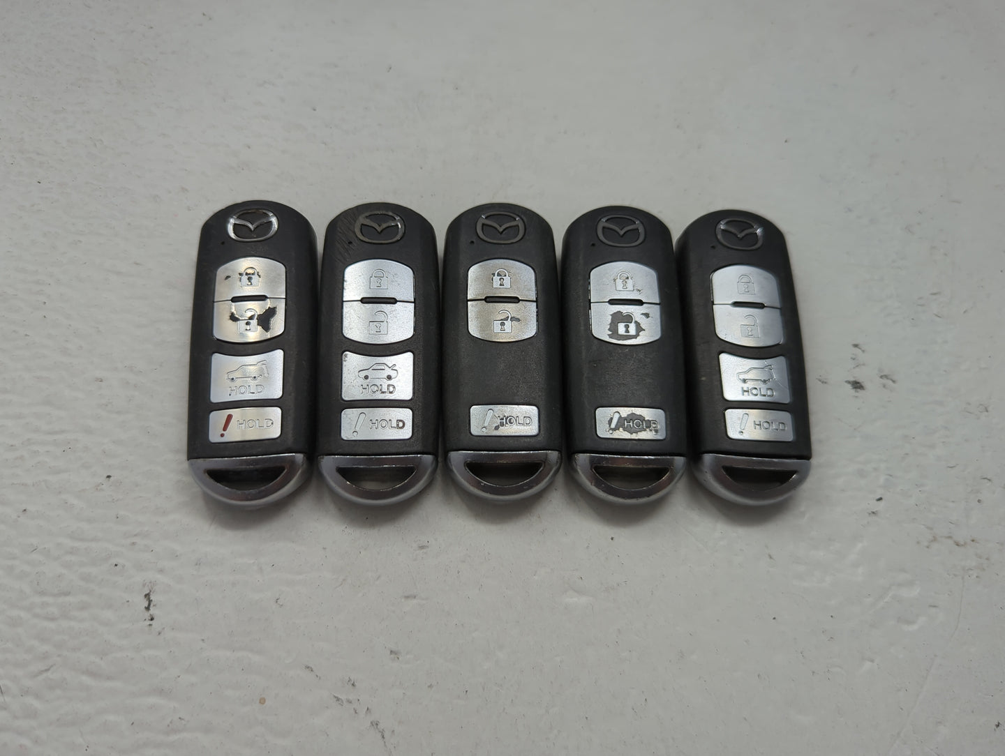 Lot of 5 Mazda Keyless Entry Remote Fob MIXED FCC IDS 1475829 - Oemusedautoparts1.com