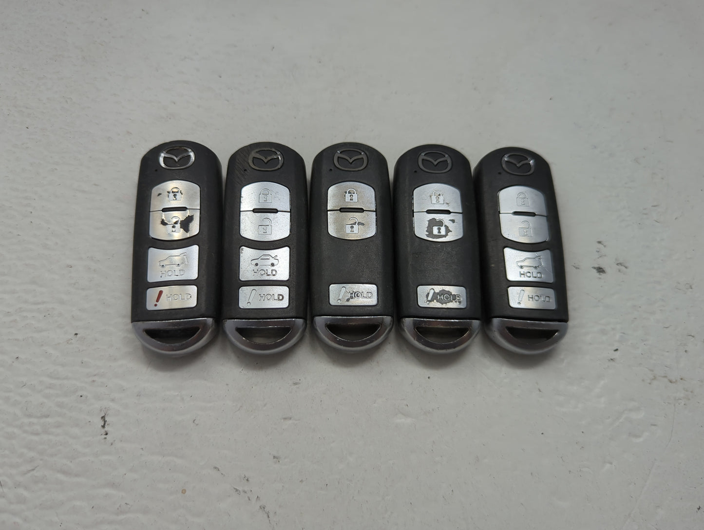 Lot of 5 Mazda Keyless Entry Remote Fob MIXED FCC IDS 1475829 - Oemusedautoparts1.com