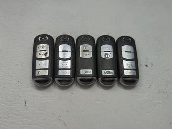 compare product Lot of 5 Mazda Keyless Entry Remote Fob MIXED FCC IDS 1475829