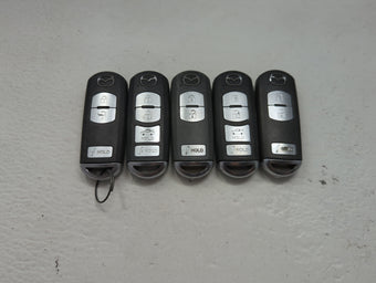 compare product Lot of 5 Mazda Keyless Entry Remote Fob MIXED FCC IDS 1475830