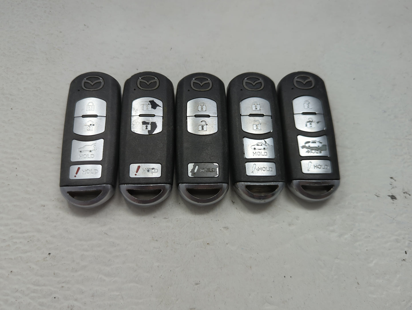 Lot of 5 Mazda Keyless Entry Remote Fob MIXED FCC IDS 1475831 - Oemusedautoparts1.com
