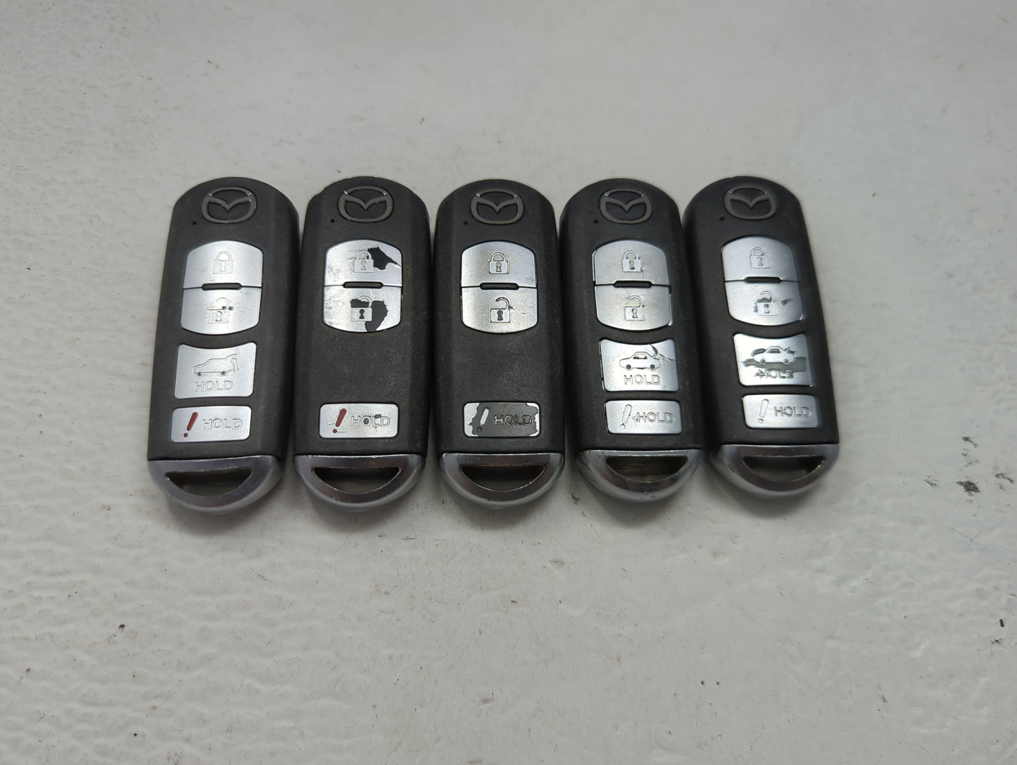 Lot of 5 Mazda Keyless Entry Remote Fob MIXED FCC IDS 1475831 - Oemusedautoparts1.com