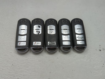 compare product Lot of 5 Mazda Keyless Entry Remote Fob MIXED FCC IDS 1475831