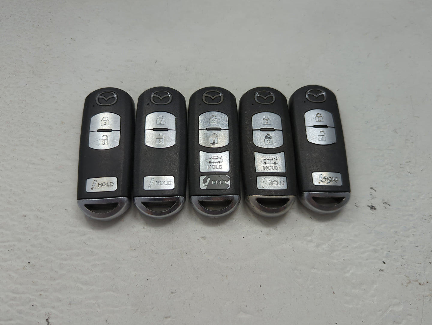 Lot of 5 Mazda Keyless Entry Remote Fob MIXED FCC IDS 1475832 - Oemusedautoparts1.com