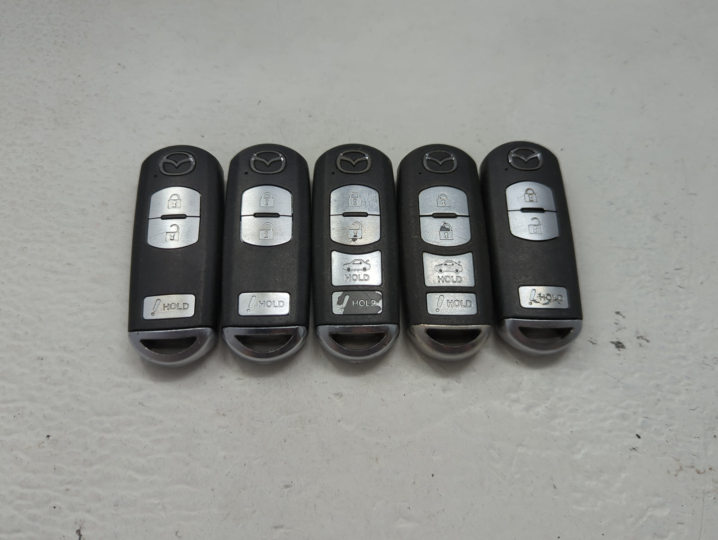Lot of 5 Mazda Keyless Entry Remote Fob MIXED FCC IDS 1475832 - Oemusedautoparts1.com