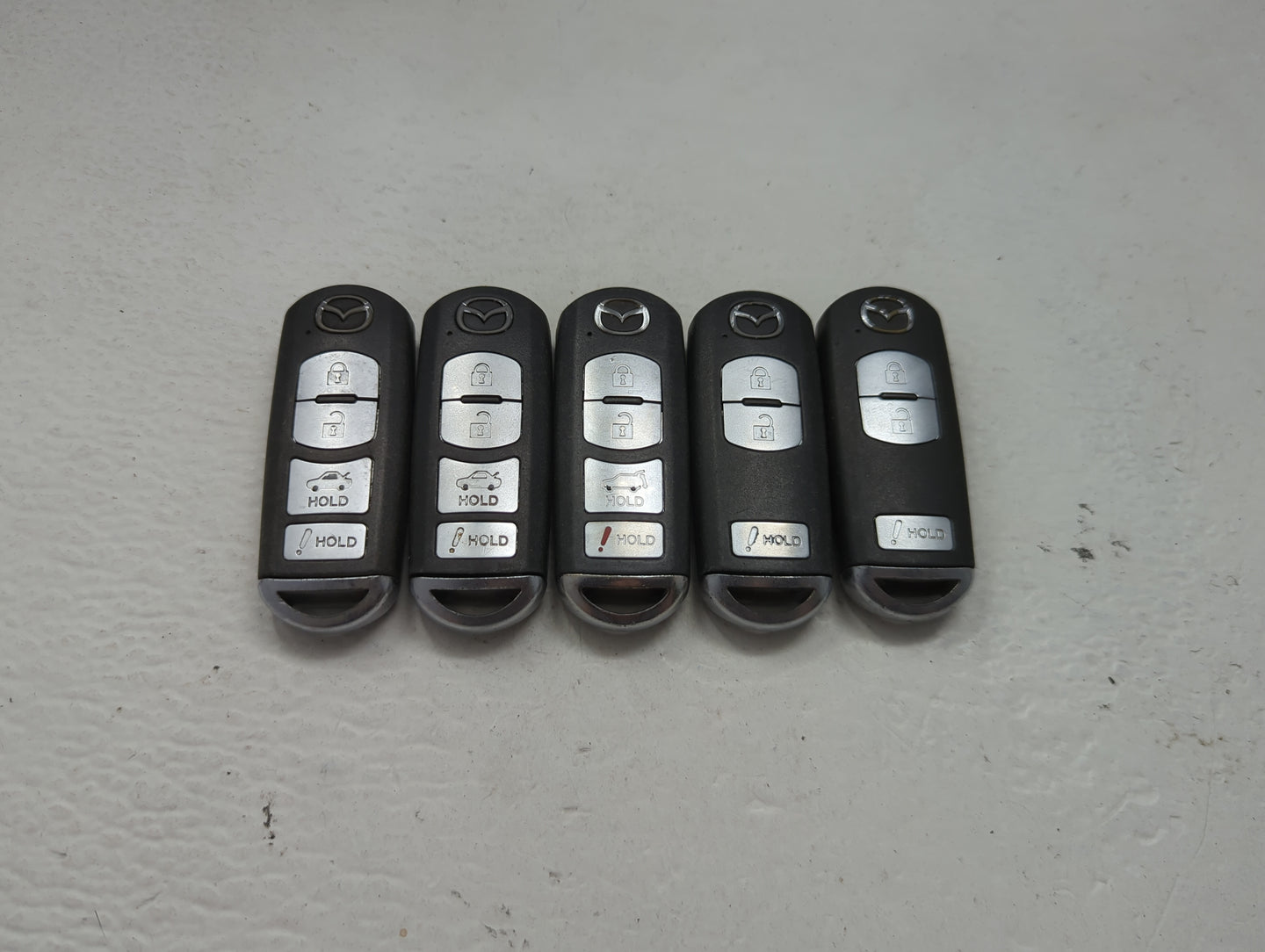 Lot of 5 Mazda Keyless Entry Remote Fob MIXED FCC IDS 1475843 - Oemusedautoparts1.com