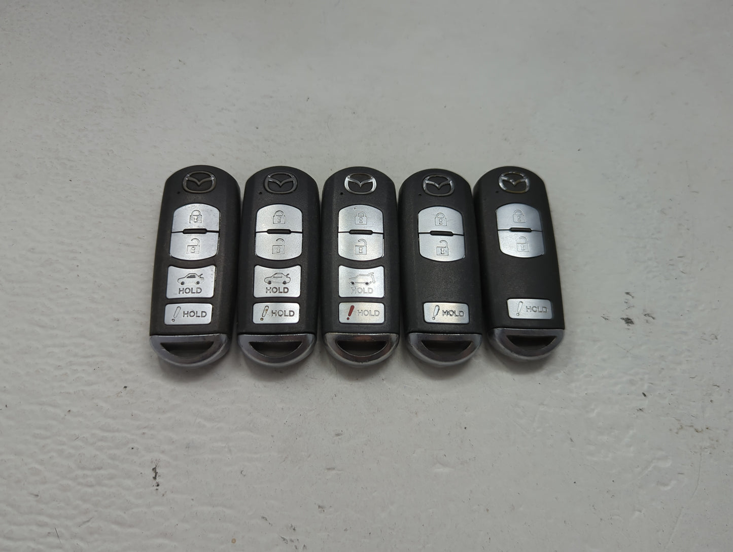 Lot of 5 Mazda Keyless Entry Remote Fob MIXED FCC IDS 1475843 - Oemusedautoparts1.com