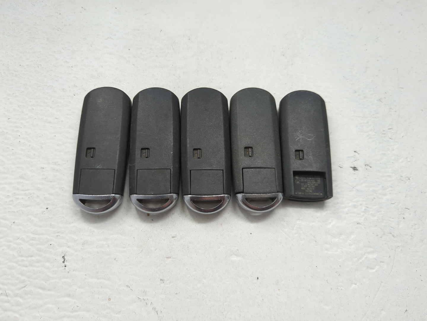 Lot of 5 Mazda Keyless Entry Remote Fob MIXED FCC IDS 1475844 - Oemusedautoparts1.com