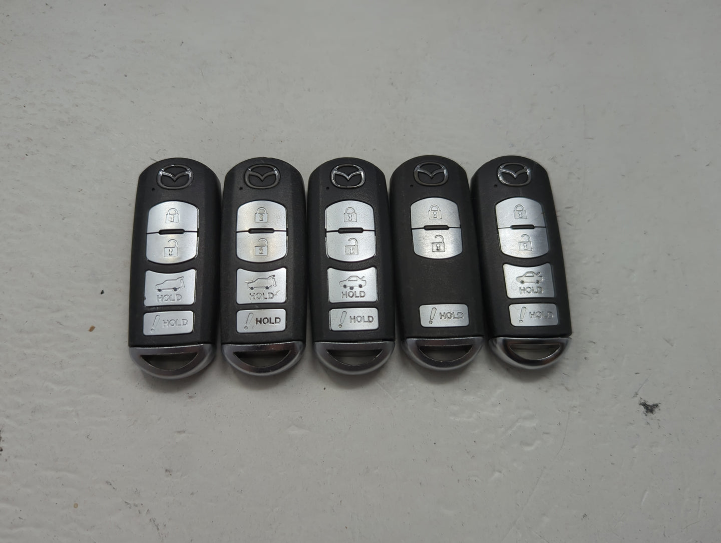 Lot of 5 Mazda Keyless Entry Remote Fob MIXED FCC IDS 1475845 - Oemusedautoparts1.com