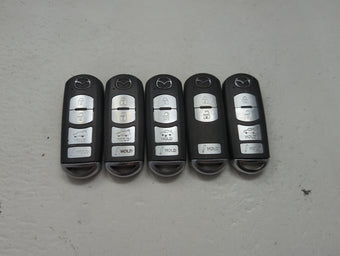 compare product Lot of 5 Mazda Keyless Entry Remote Fob MIXED FCC IDS 1475845