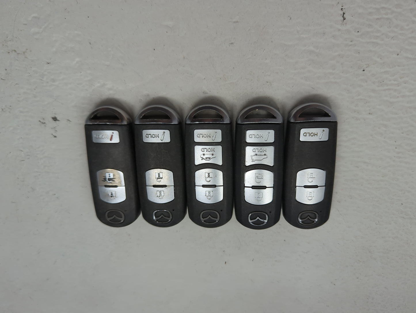 Lot of 5 Mazda Keyless Entry Remote Fob MIXED FCC IDS 1475847 - Oemusedautoparts1.com