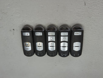 compare product Lot of 5 Mazda Keyless Entry Remote Fob MIXED FCC IDS 1475847