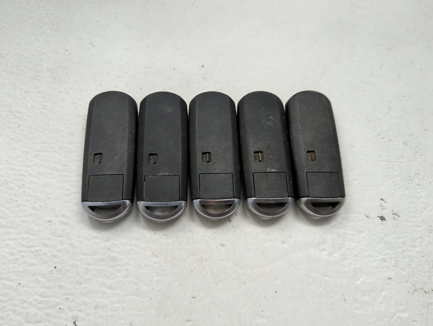 Lot of 5 Mazda Keyless Entry Remote Fob MIXED FCC IDS 1475847 - Oemusedautoparts1.com