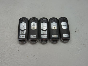 compare product Lot of 5 Mazda Keyless Entry Remote Fob MIXED FCC IDS 1475848