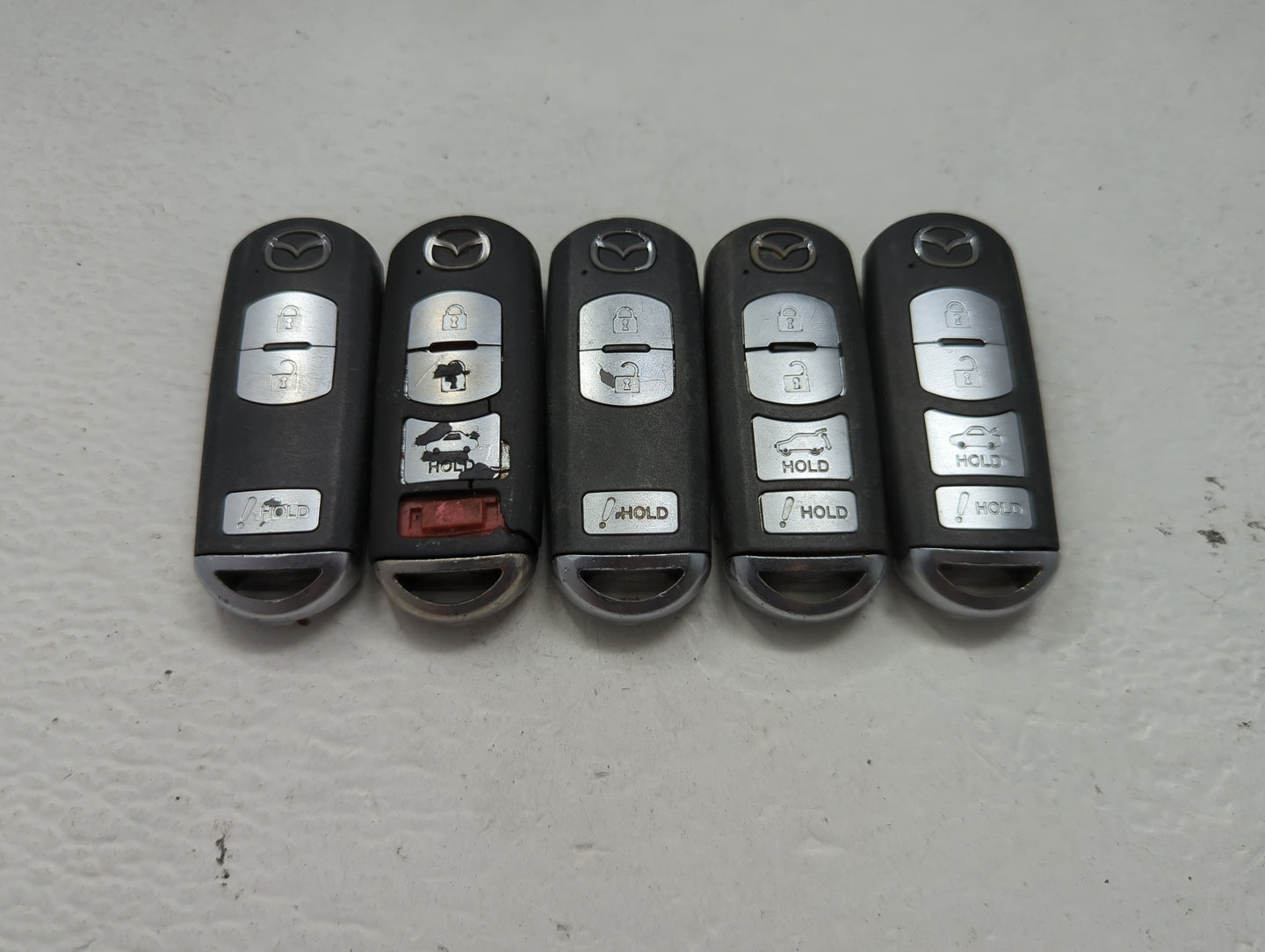 Lot of 5 Mazda Keyless Entry Remote Fob MIXED FCC IDS 1475866 - Oemusedautoparts1.com