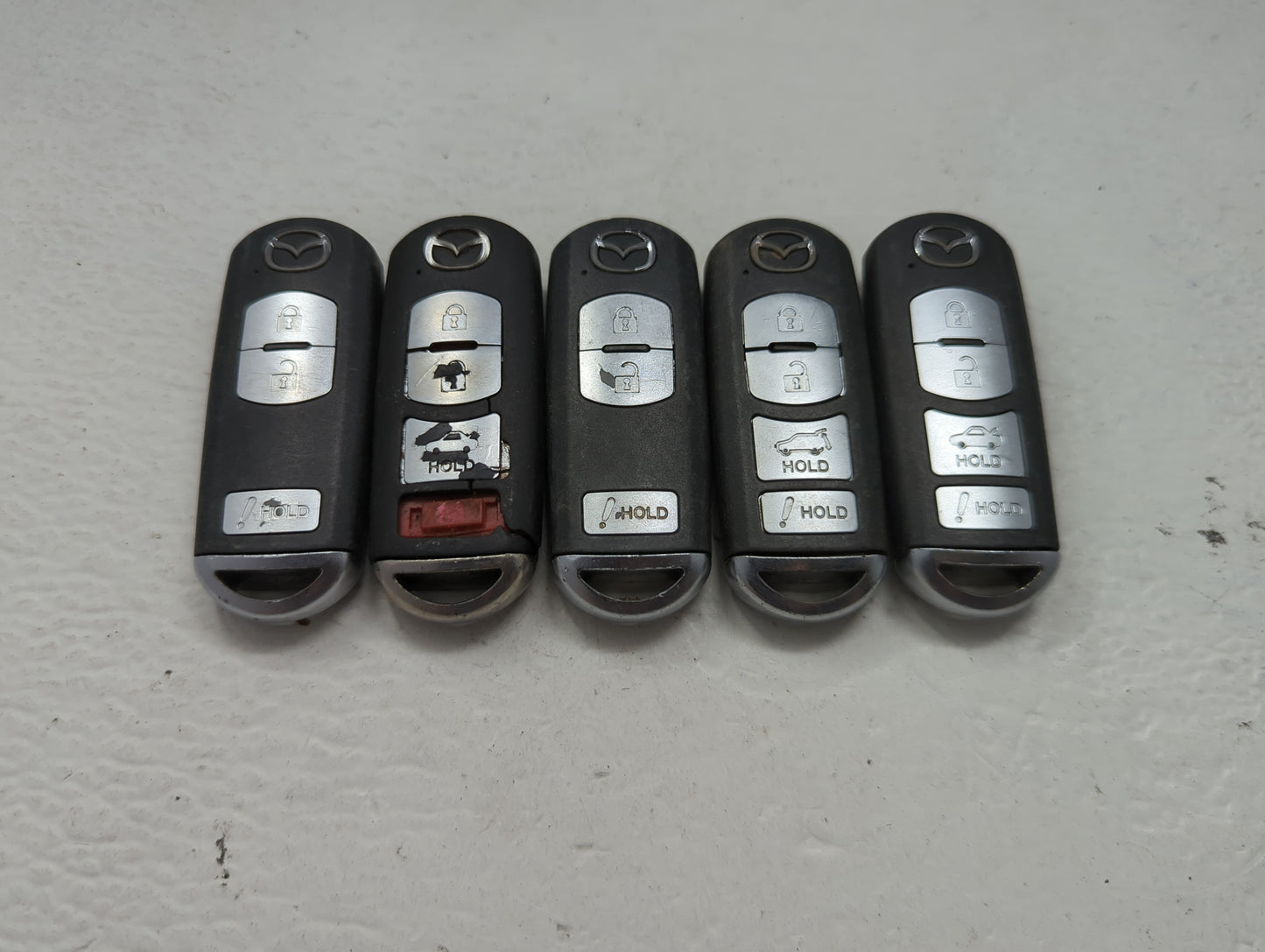 Lot of 5 Mazda Keyless Entry Remote Fob MIXED FCC IDS 1475866 - Oemusedautoparts1.com