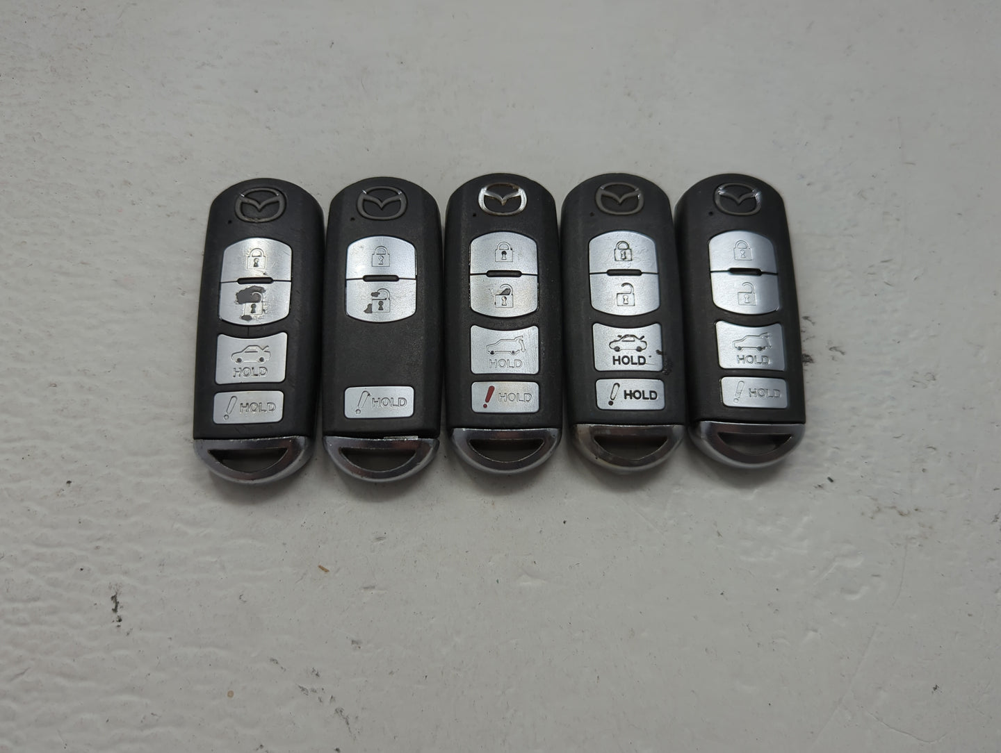 Lot of 5 Mazda Keyless Entry Remote Fob MIXED FCC IDS 1475868 - Oemusedautoparts1.com