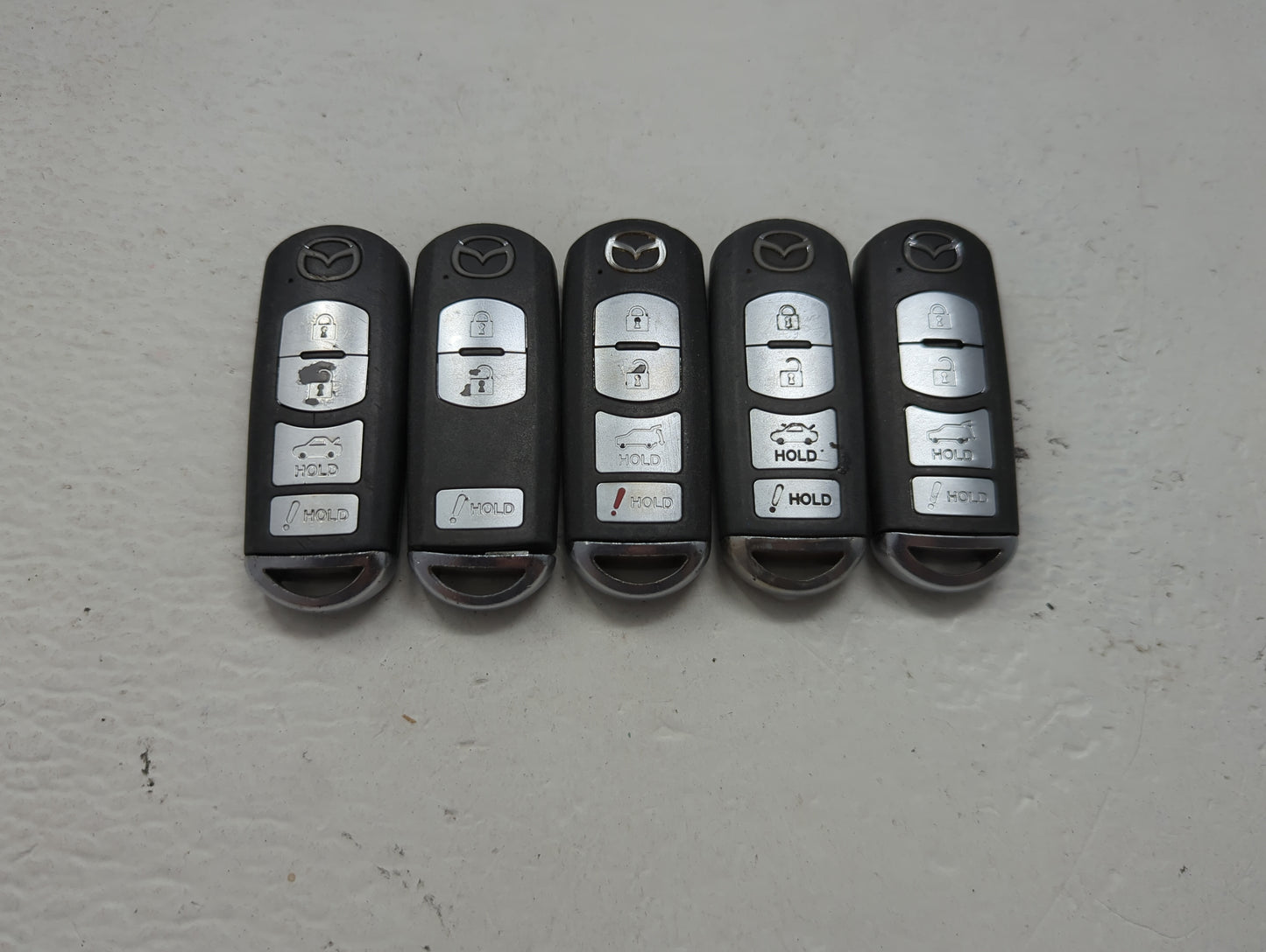 Lot of 5 Mazda Keyless Entry Remote Fob MIXED FCC IDS 1475868 - Oemusedautoparts1.com