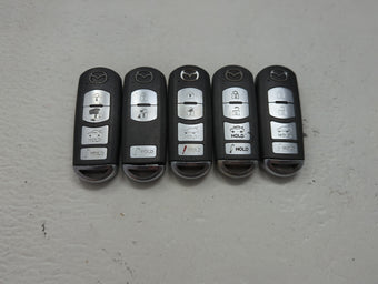 compare product Lot of 5 Mazda Keyless Entry Remote Fob MIXED FCC IDS 1475868