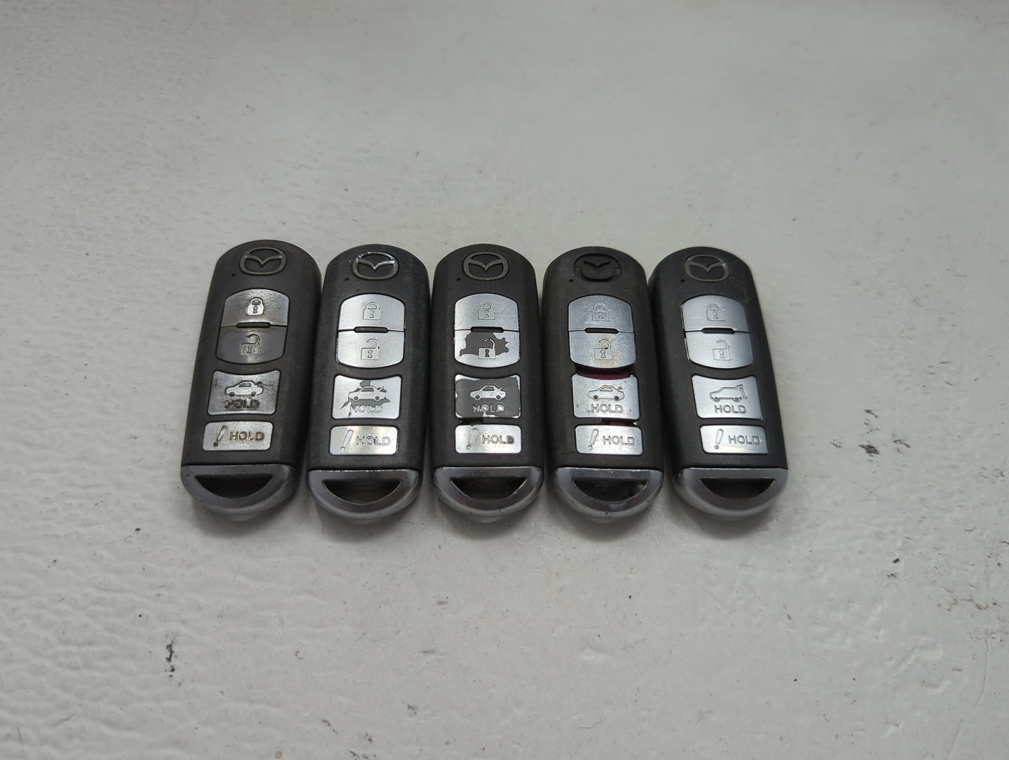 Lot of 5 Mazda Keyless Entry Remote Fob MIXED FCC IDS 1475869 - Oemusedautoparts1.com