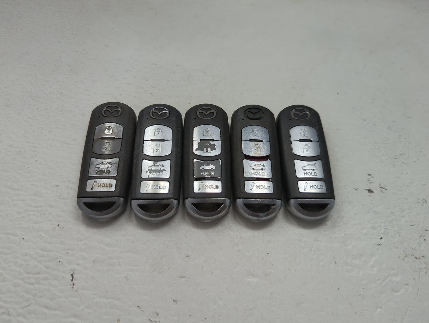 Lot of 5 Mazda Keyless Entry Remote Fob MIXED FCC IDS 1475869 - Oemusedautoparts1.com