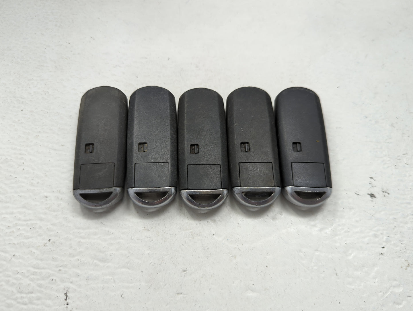Lot of 5 Mazda Keyless Entry Remote Fob MIXED FCC IDS 1475869 - Oemusedautoparts1.com
