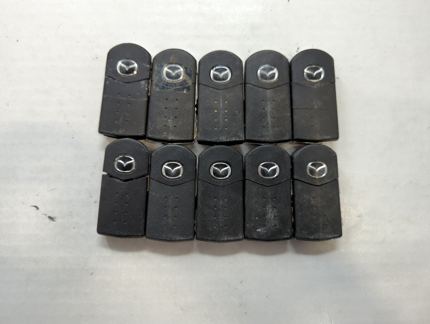 Lot of 10 Mazda Keyless Entry Remote Fob MIXED FCC IDS MIXED PART NUMBERS - Oemusedautoparts1.com
