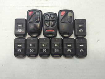 compare product Lot of 11 Mazda Keyless Entry Remote Fob PCMINI | OUCG8D-333A-A |