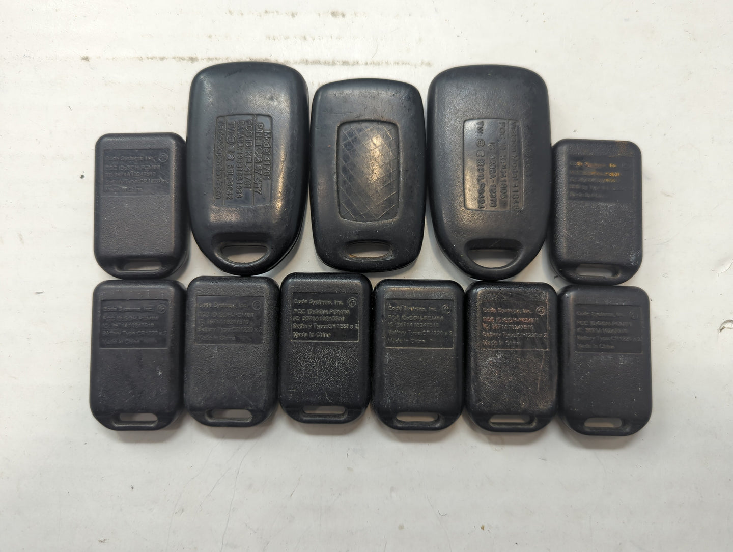 Lot of 11 Mazda Keyless Entry Remote Fob PCMINI | OUCG8D-333A-A | - Oemusedautoparts1.com